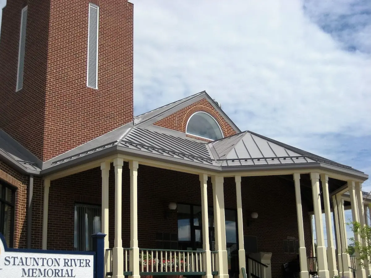 Skilled roofing craftsmen working on a residential roof in Pittstown